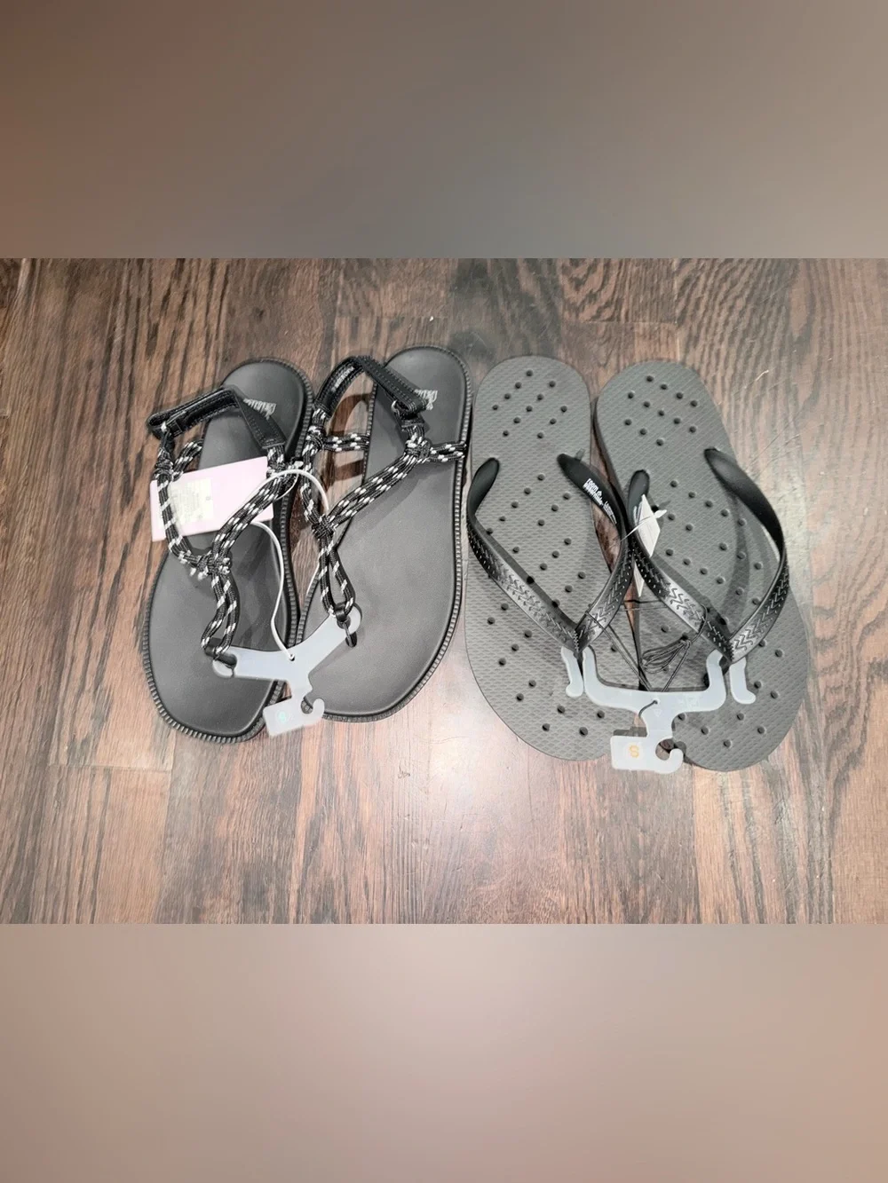Two pairs of women’s size 8 thong flip-flops
